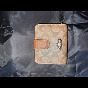 Tan and Brown Coach Trifold Wallet